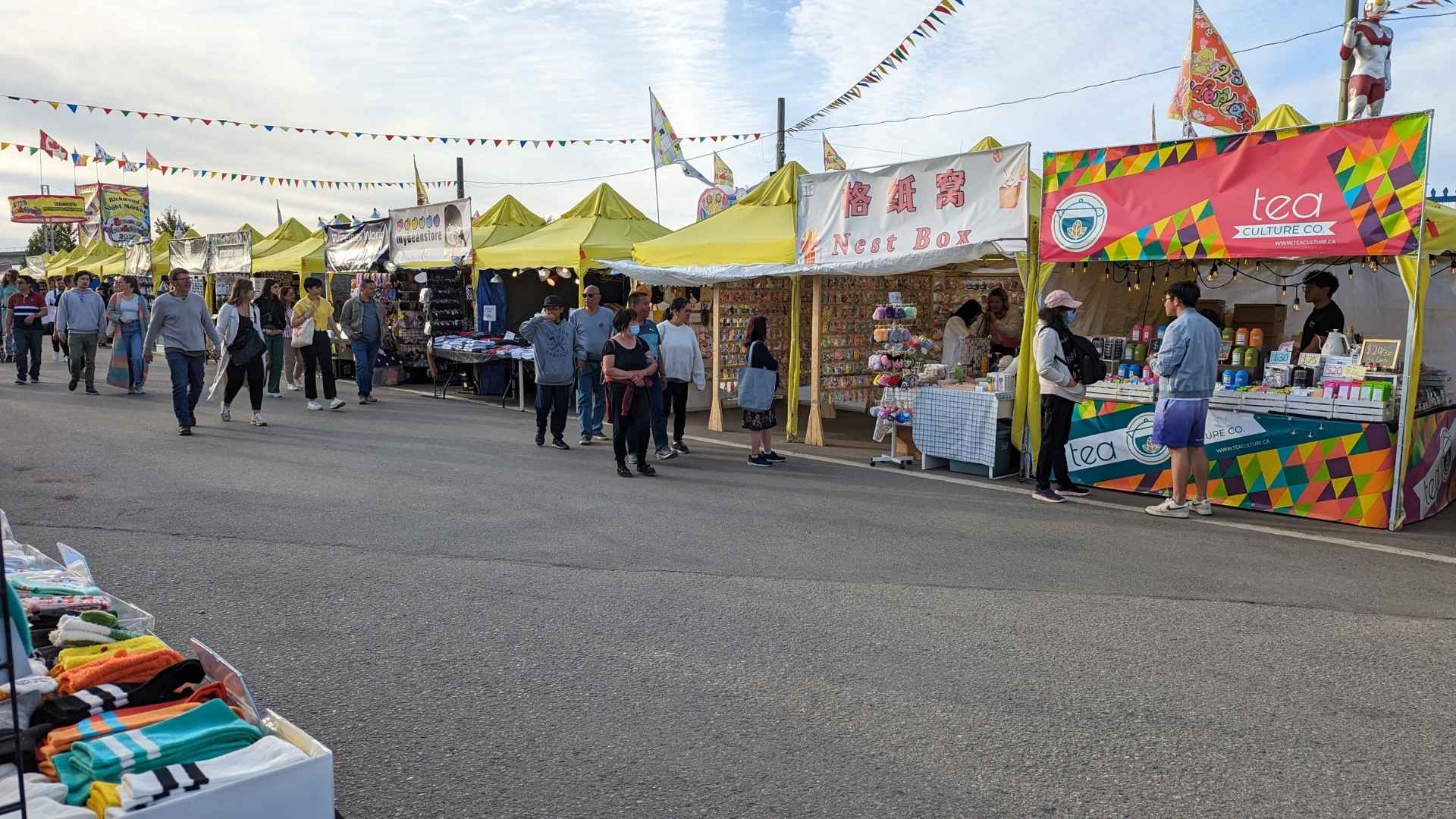 Crowds and glowing stalls at the Richmond Night Market in Richmond, BC