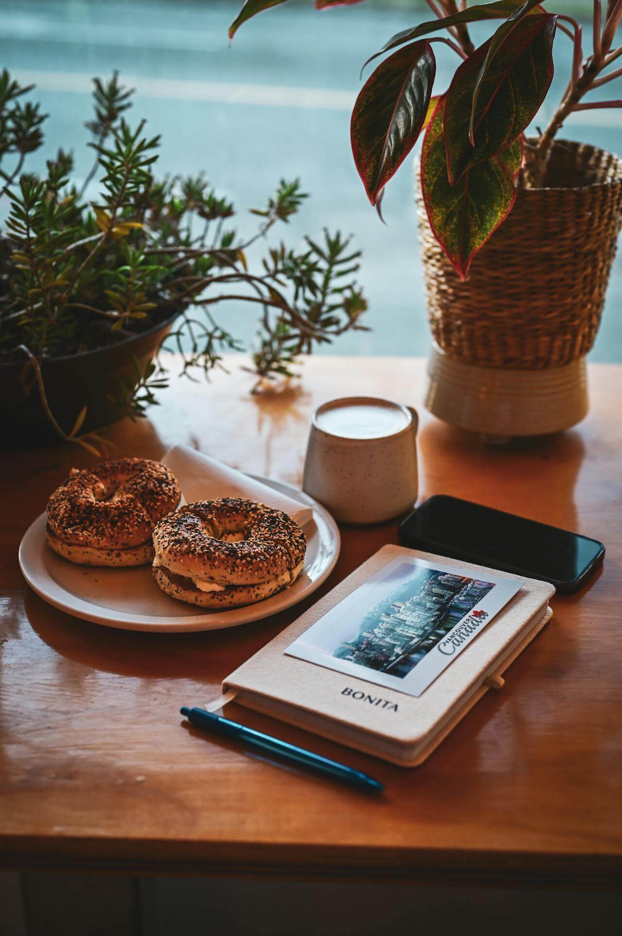 Cozy Vancouver café with a cappuccino on a wooden table