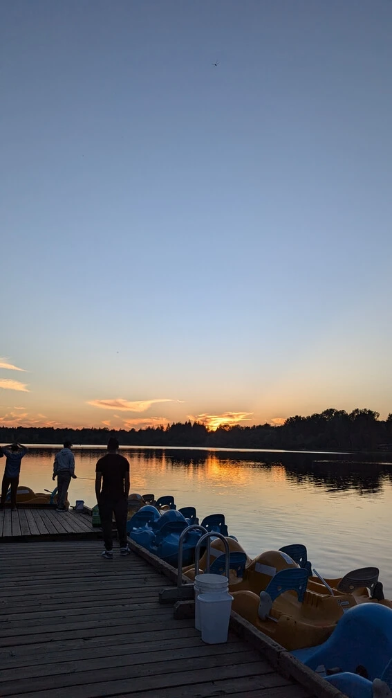 Fishing from the dock at Deer Lake Park in Burnaby