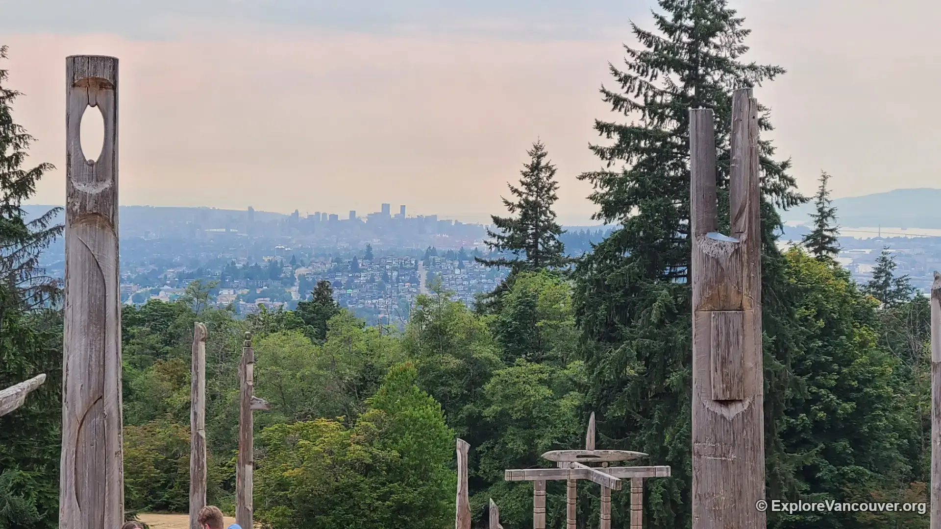 Wooden sculptures at Playground of the Gods in Burnaby Mountain Park