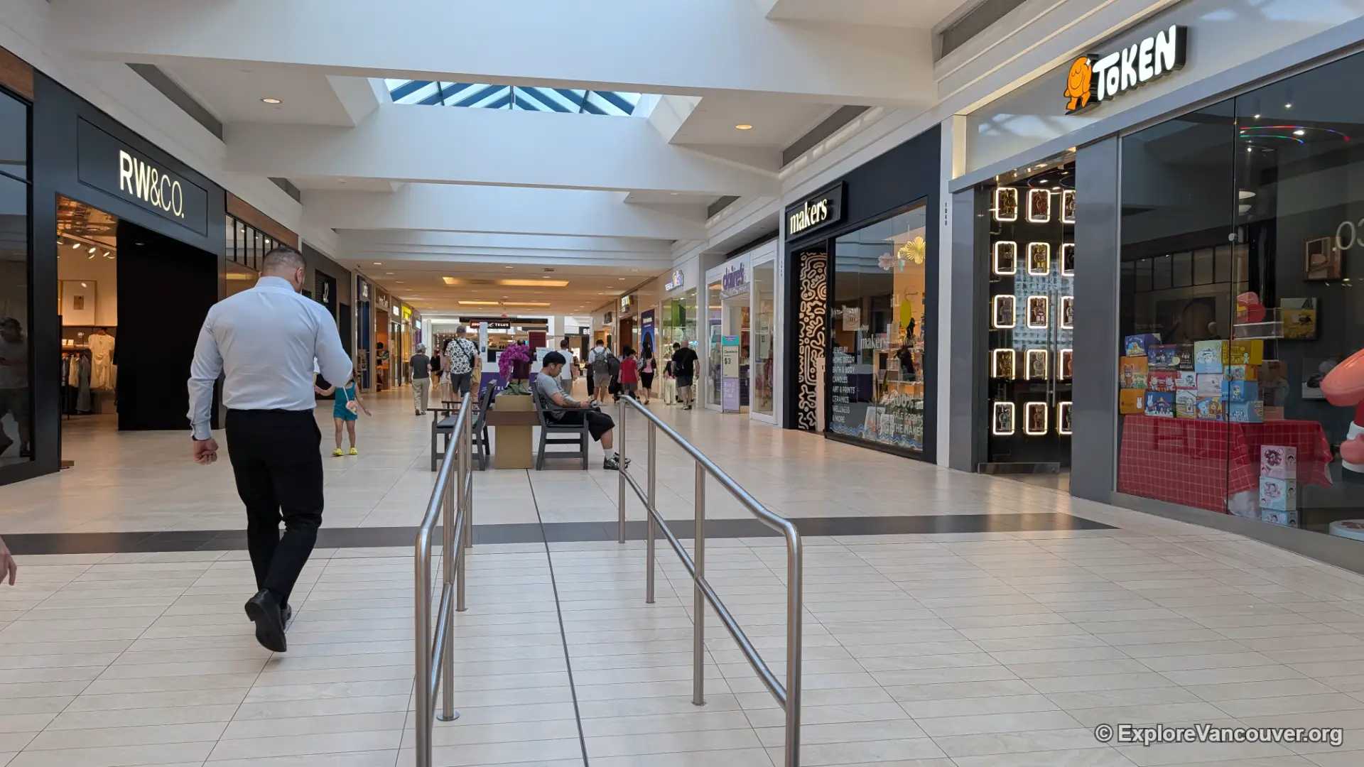 Shoppers walking through CF Richmond Centre
