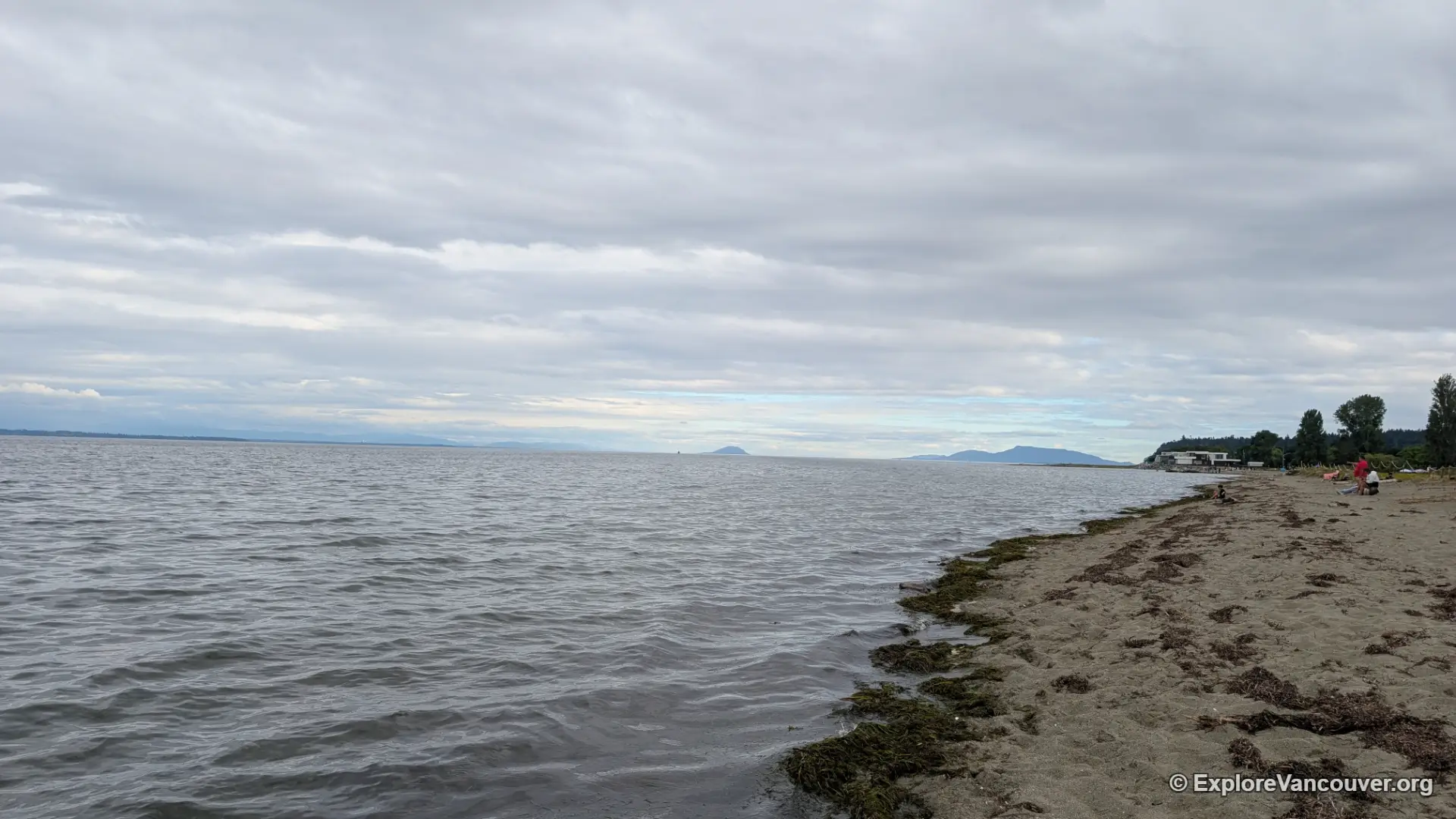 Centennial Beach shoreline on a cloudy day