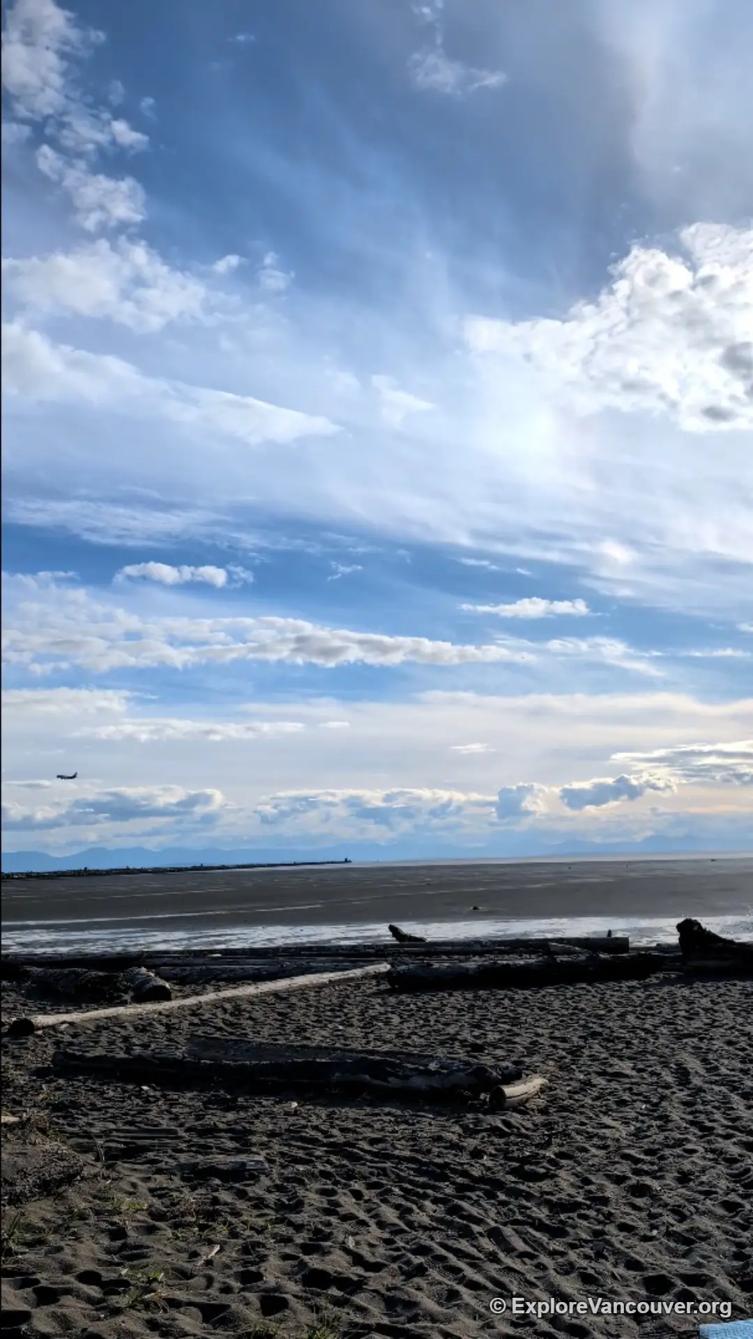 Vertical view of the open beach at Iona Beach Regional Park