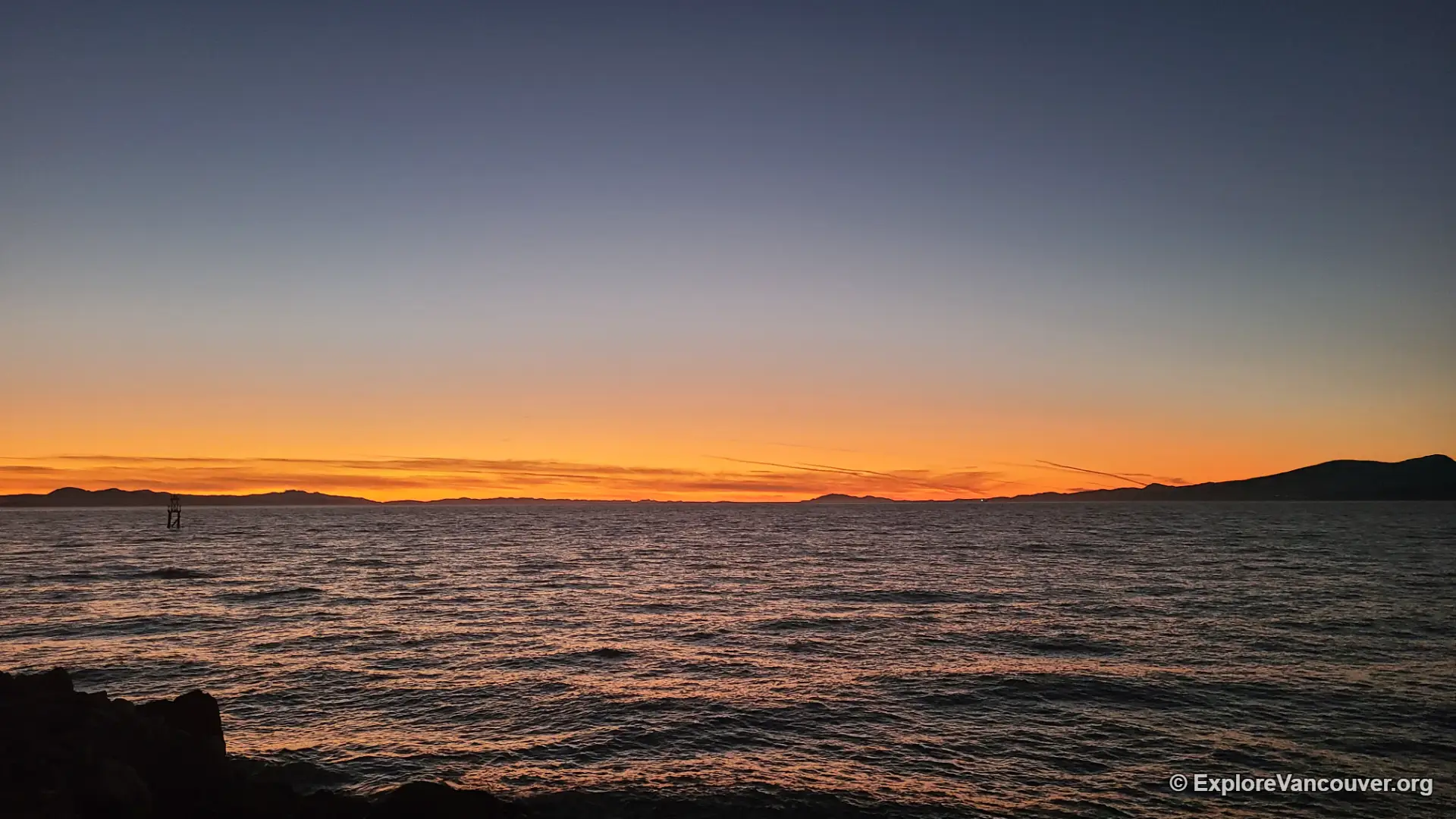 Sunset over the ocean at Iona Beach