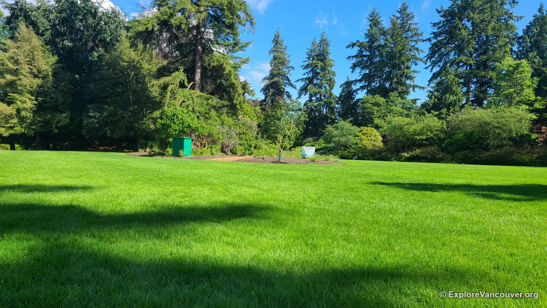 Open field and garden beds at VanDusen Botanical Garden