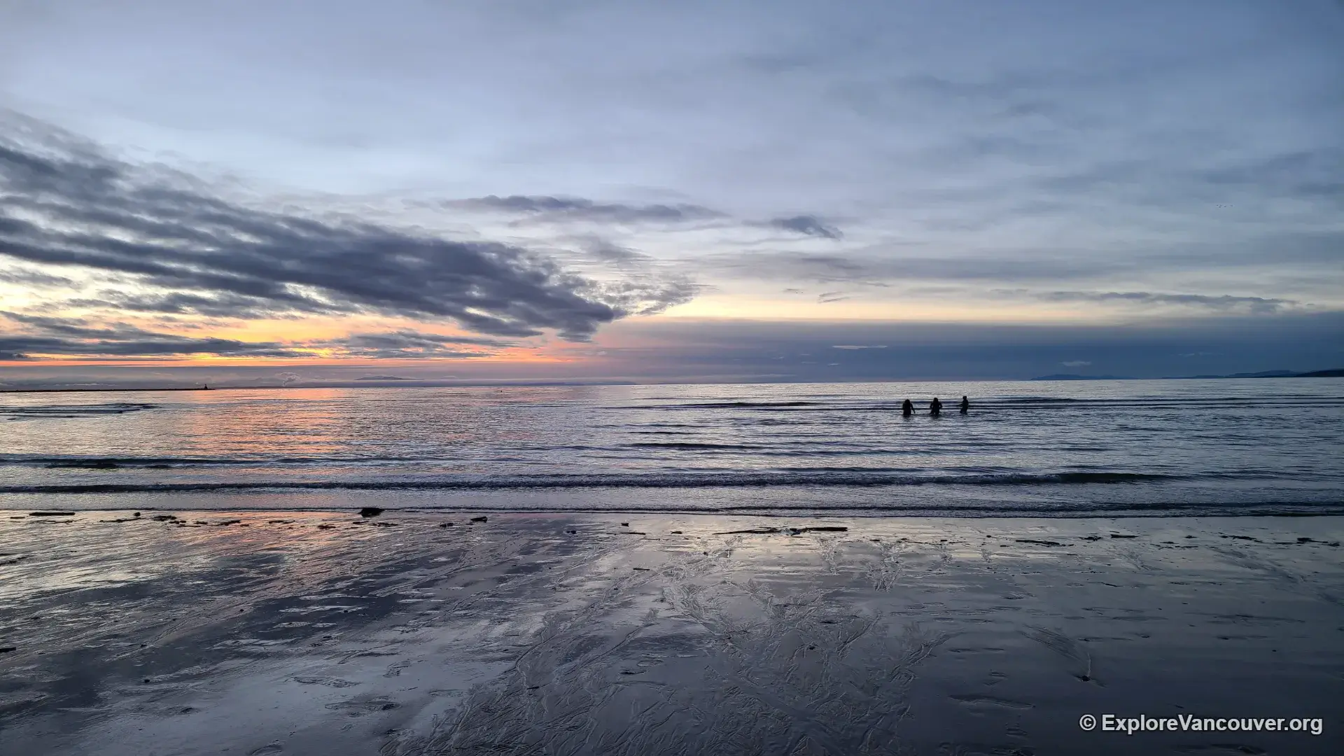 Sunset over Wreck Beach, Vancouver's clothing-optional beach at UBC