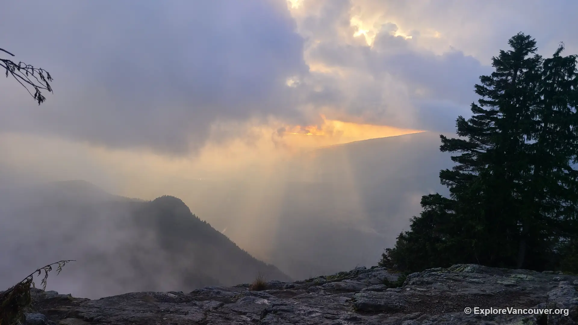 Open rocky bluff at the Dog Mountain summit with panoramic views