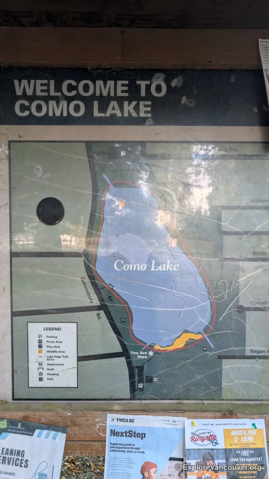 Park interpretive signage along the Como Lake walking trail in Coquitlam