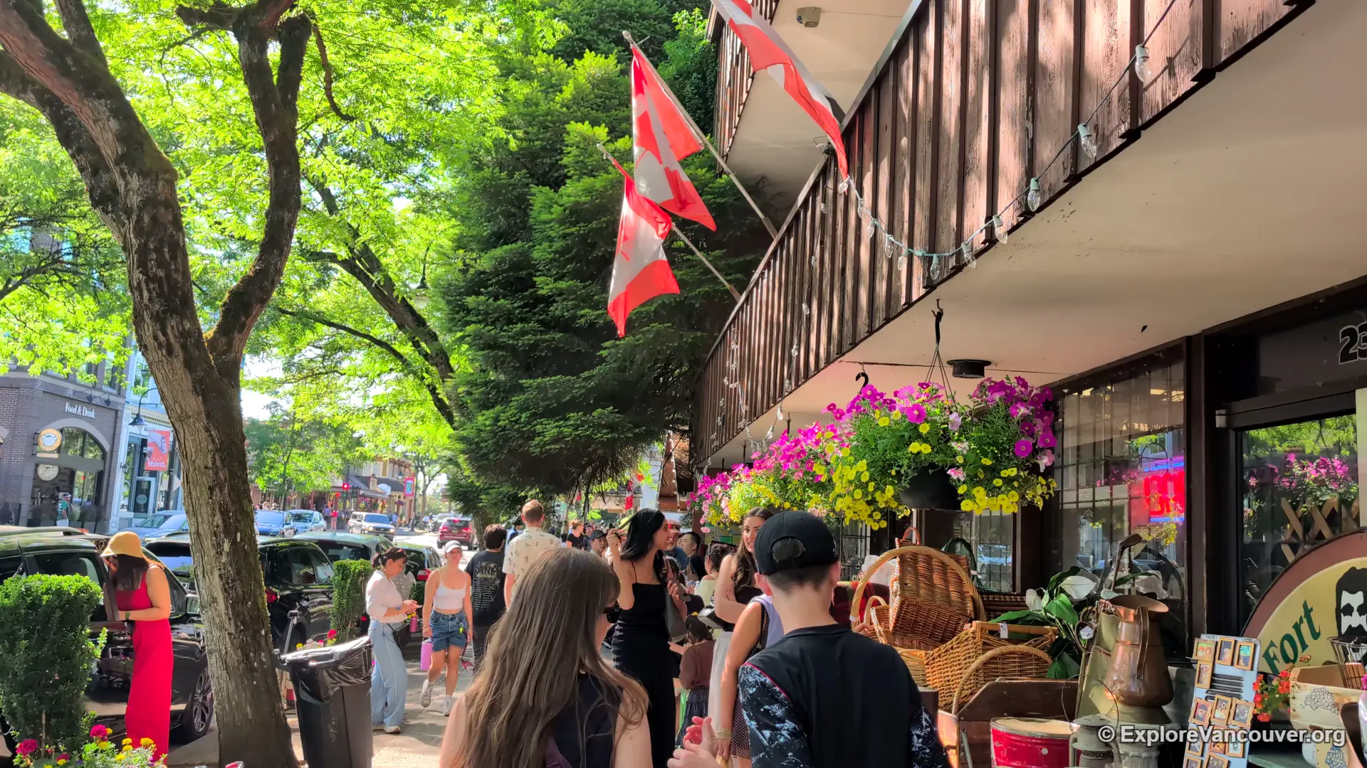 Visitors browsing shops and enjoying a sunny day in Fort Langley Village