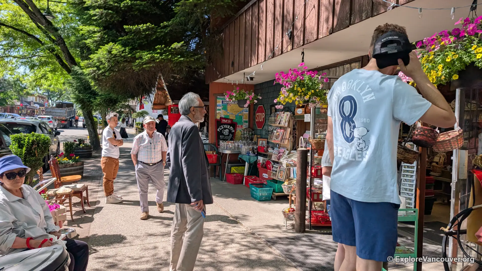 People waiting outside a shop in Fort Langley Village