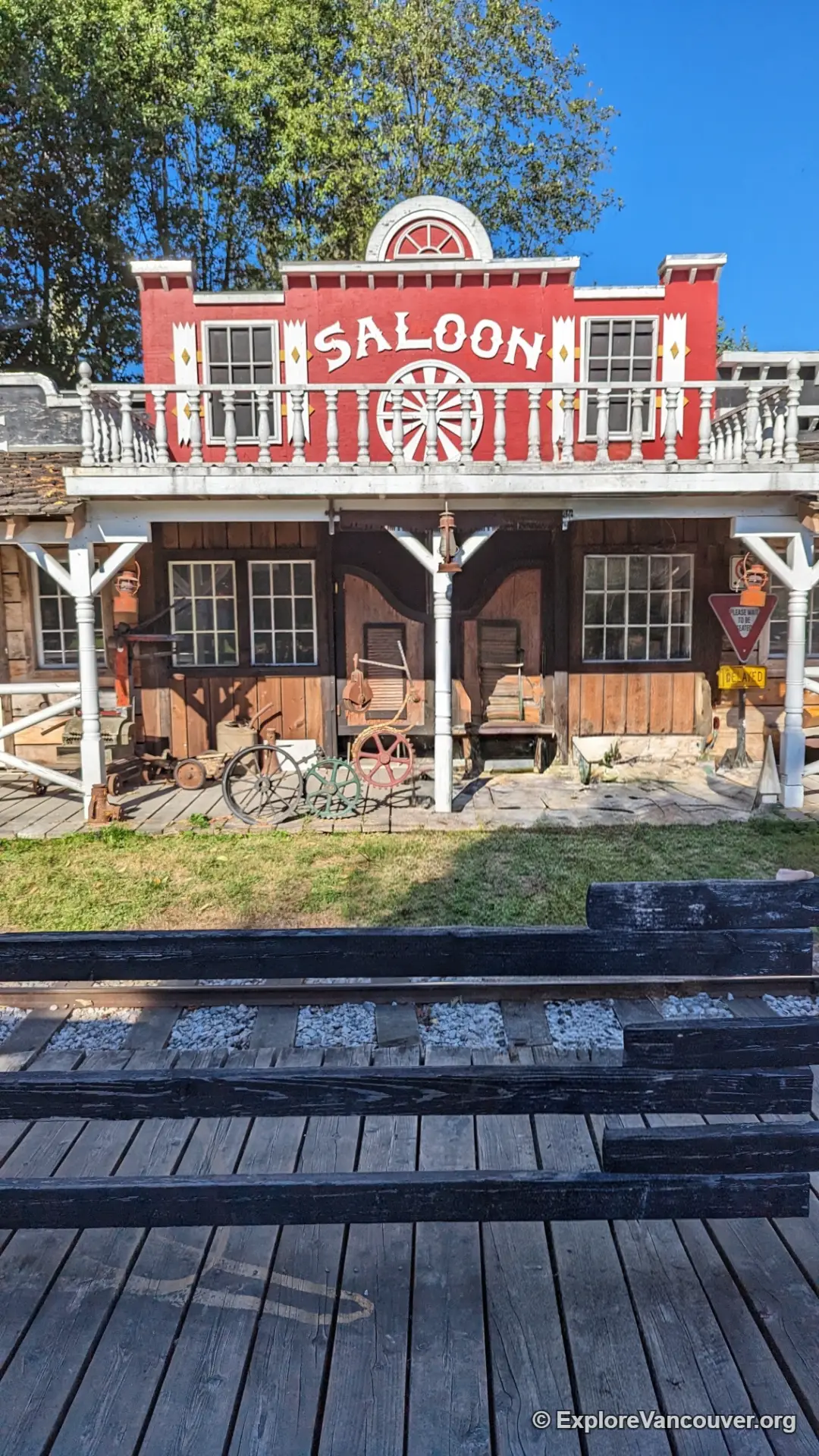 Small train station set up at the edge of the sunflower fields