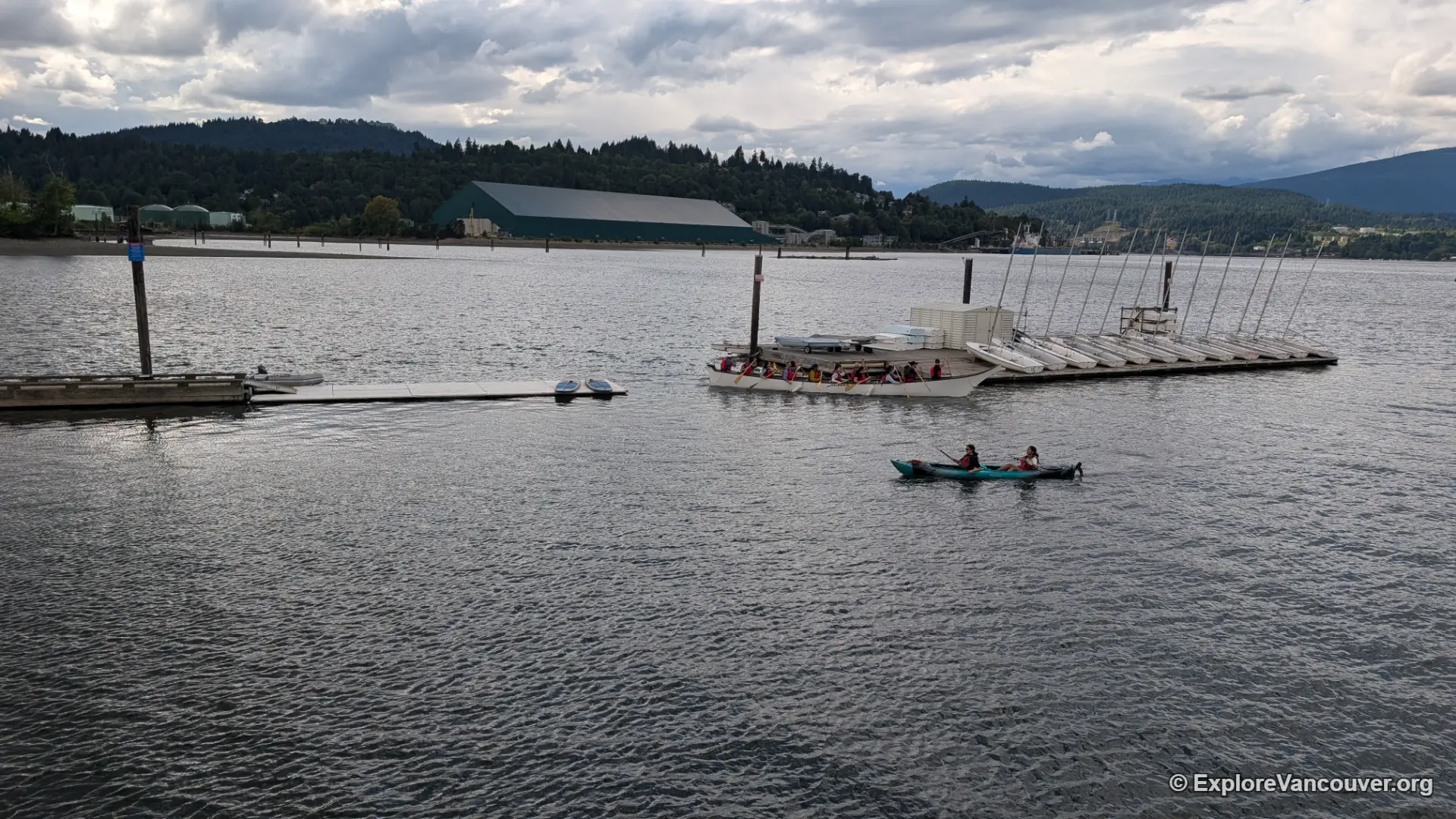 Kayaks on the water at Rocky Point in Port Moody on a cloudy day