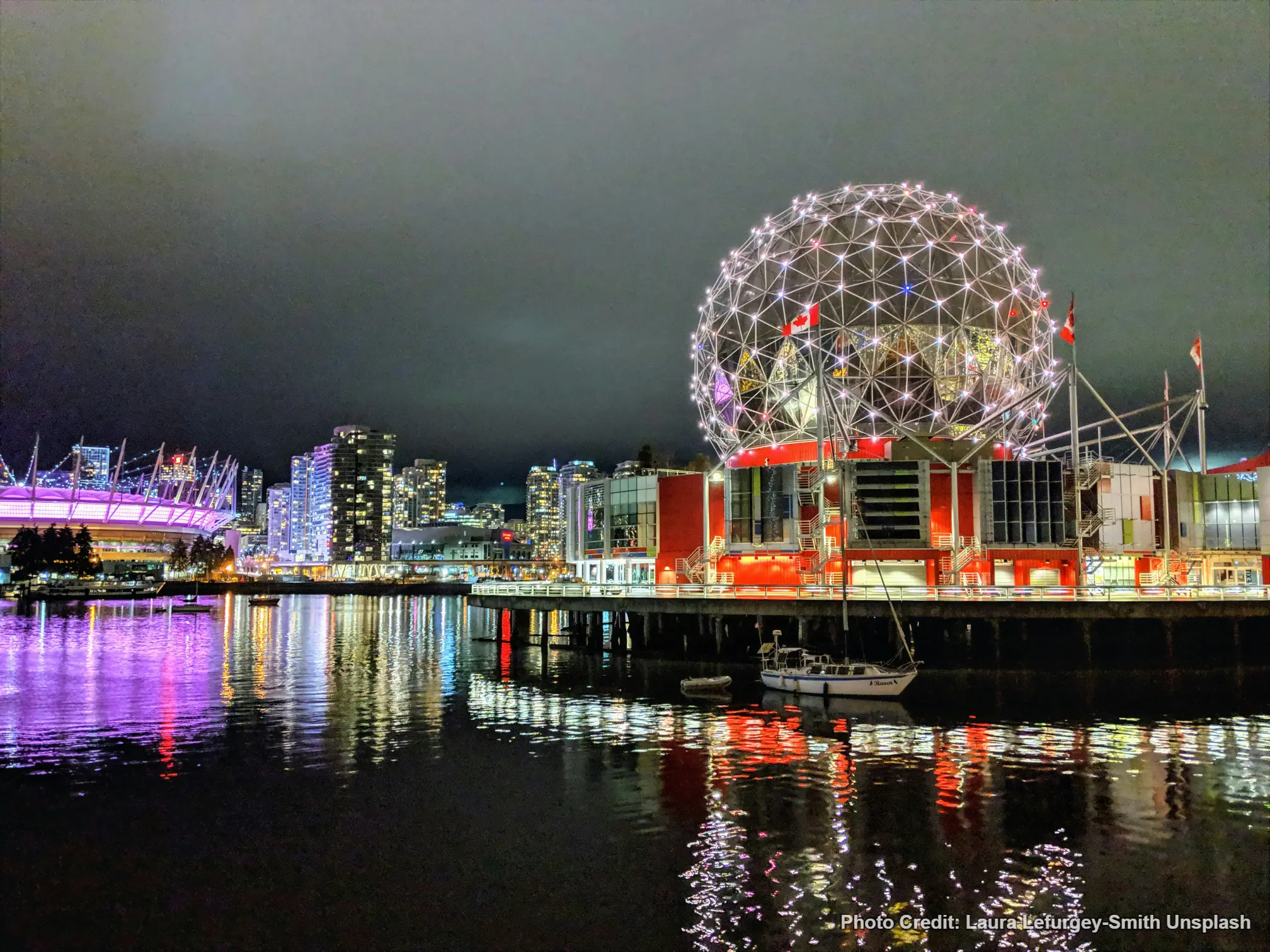 Science World lit up at night in Vancouver