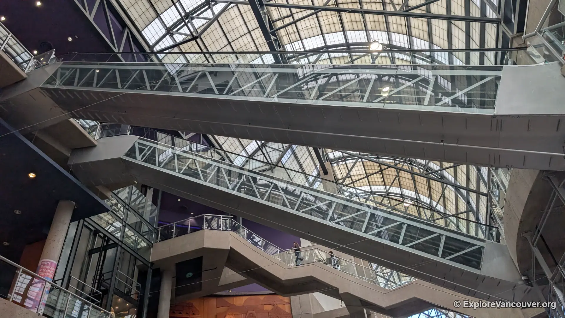 Escalators inside International Village Mall in Vancouver